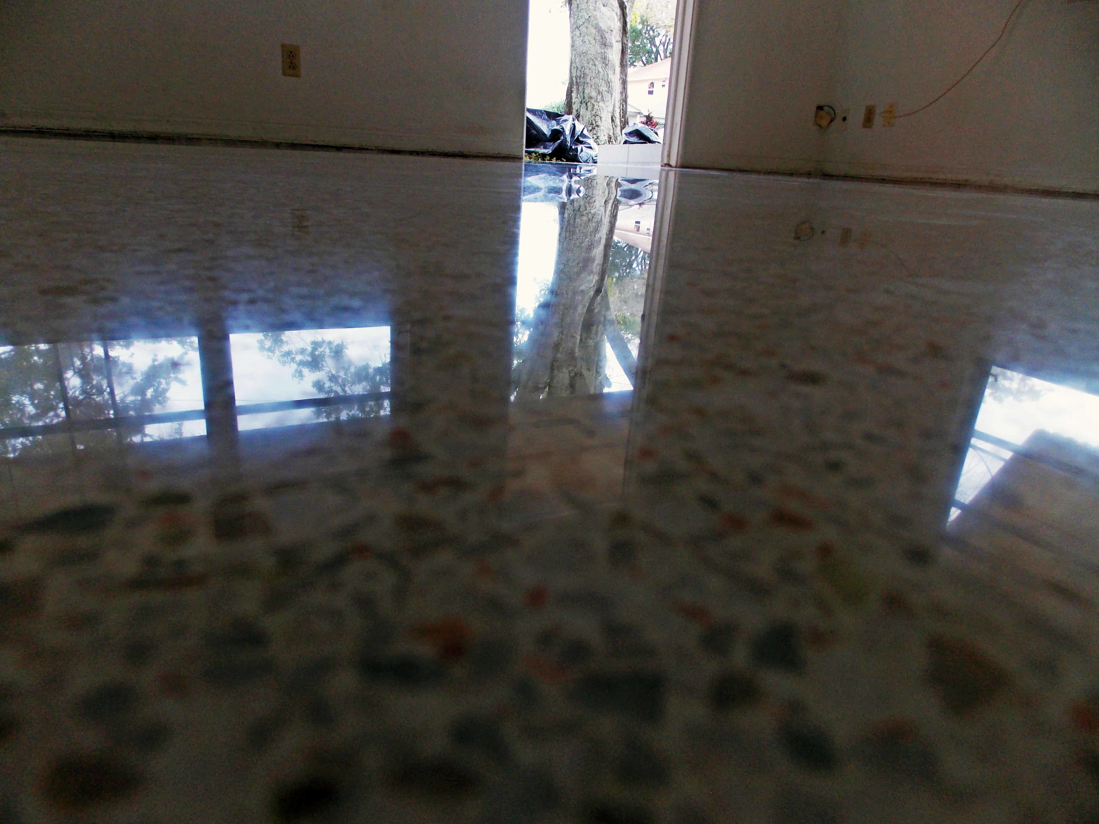 Pad Damage mostly removed from terrazzo.